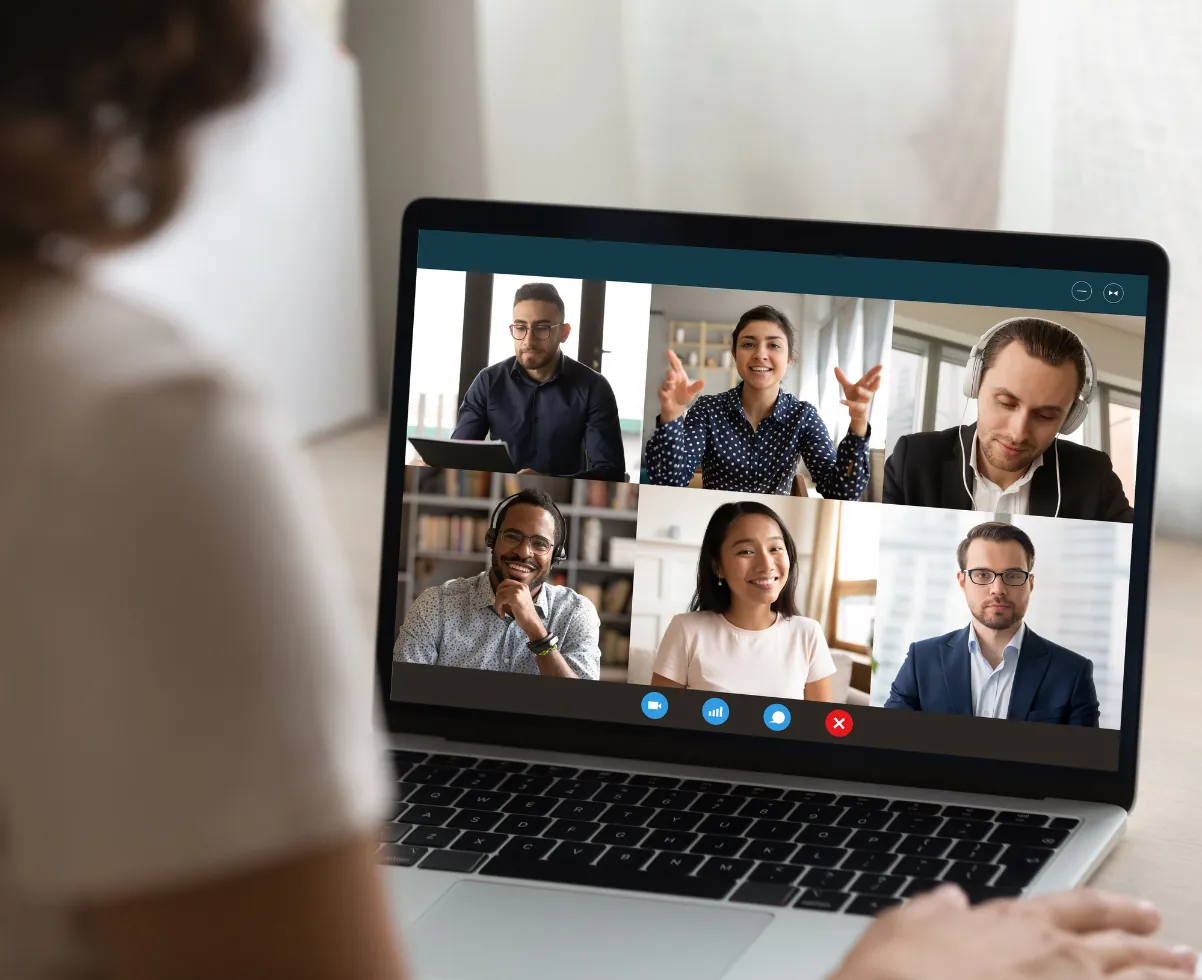 Professional reviewing work on a laptop